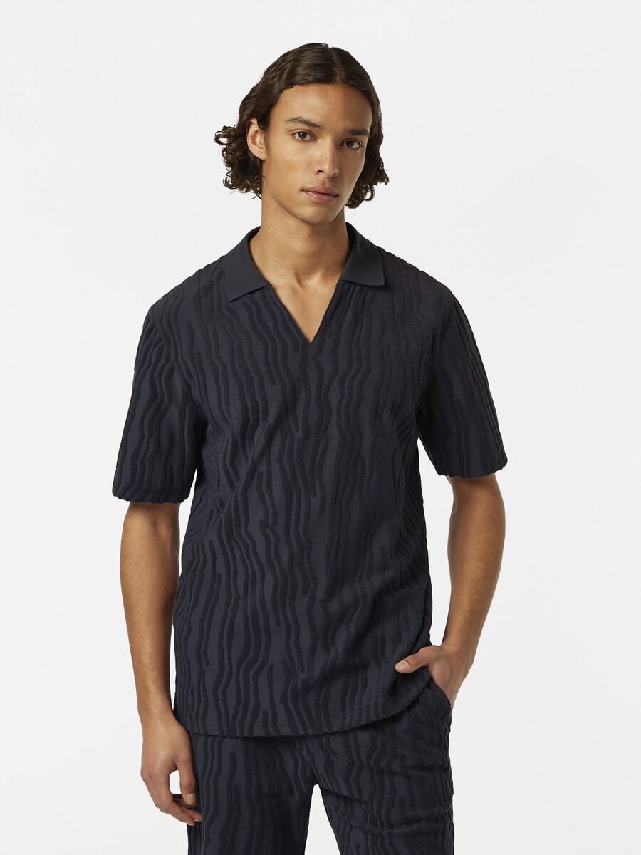 polohemd aus jacquard-baumwollfrottee mit lockerer passform