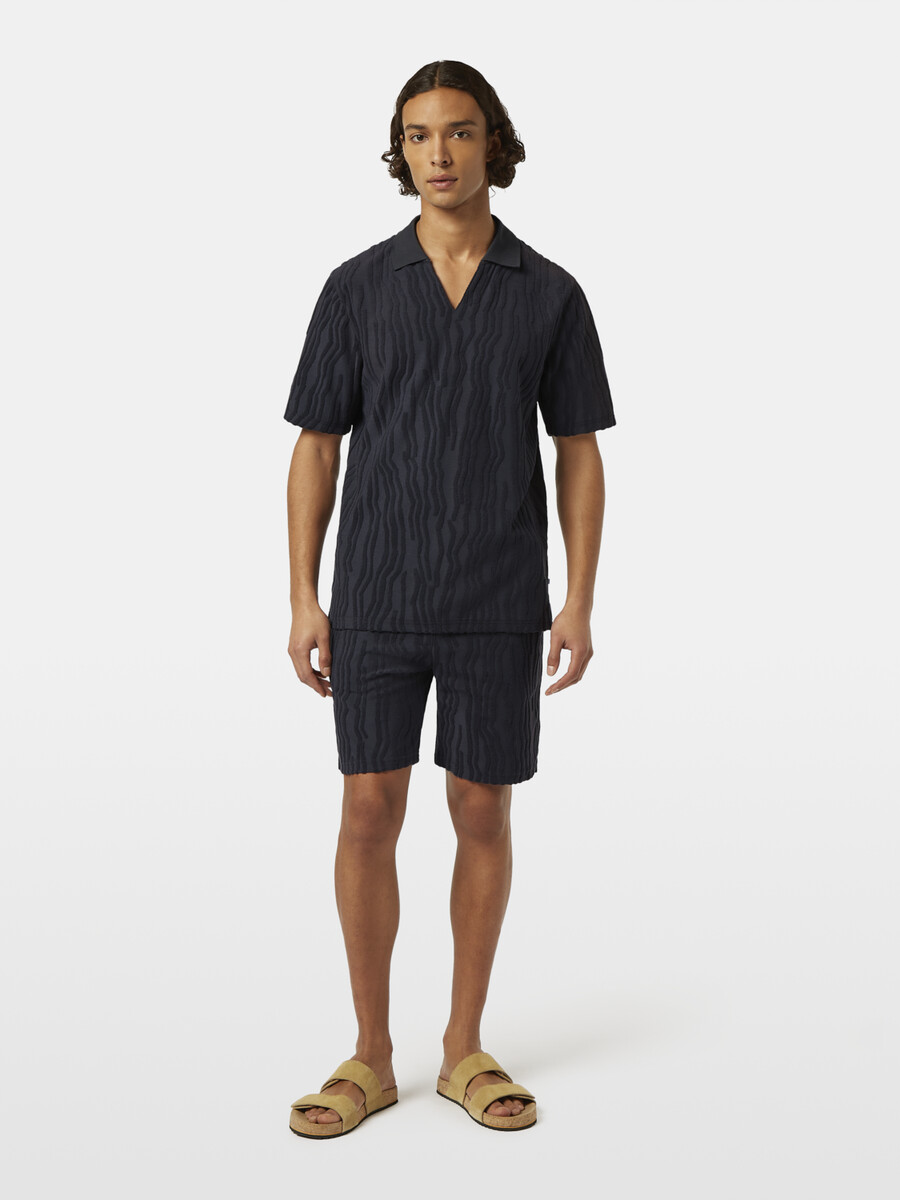 polohemd aus jacquard-baumwollfrottee mit lockerer passform
