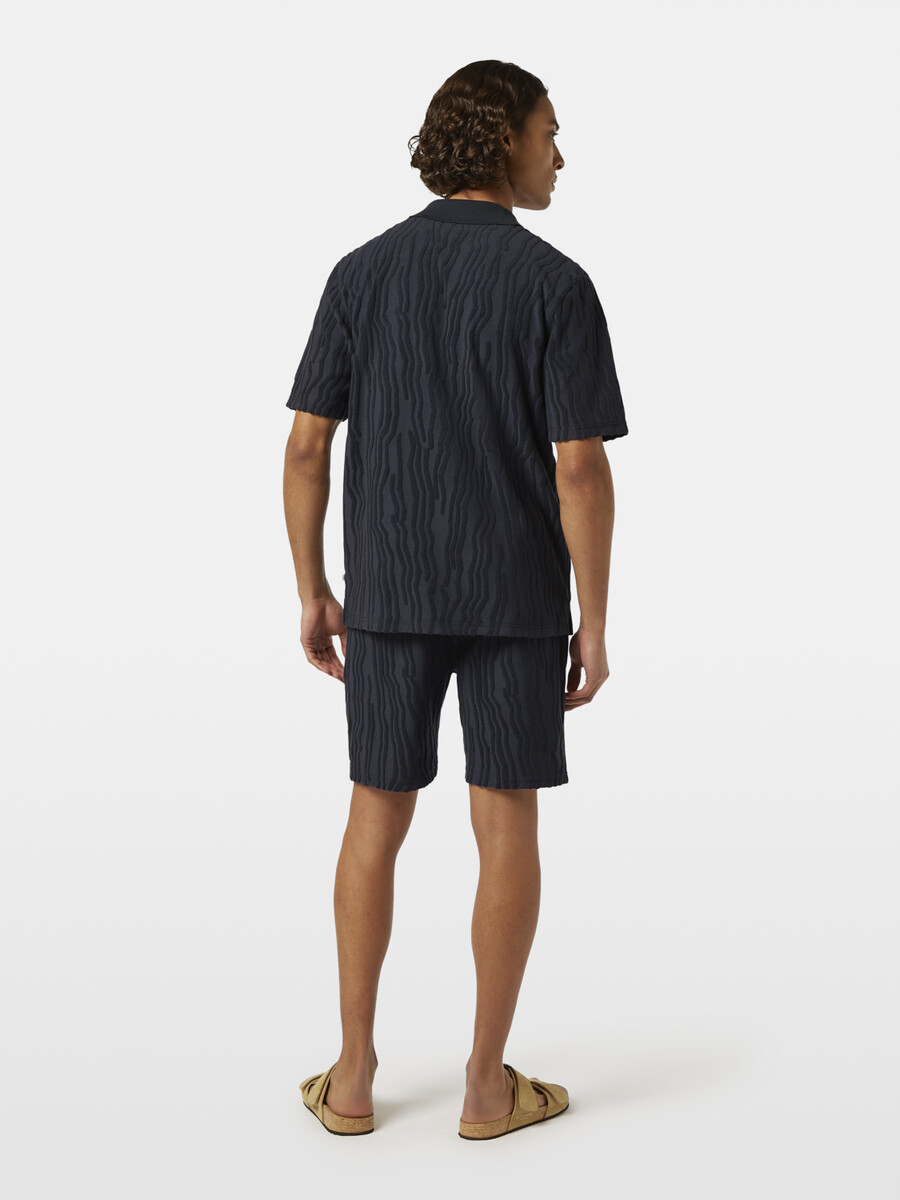polohemd aus jacquard-baumwollfrottee mit lockerer passform