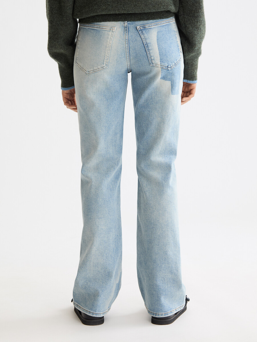 die glow bootcut jeans – kunst aus dem herzen