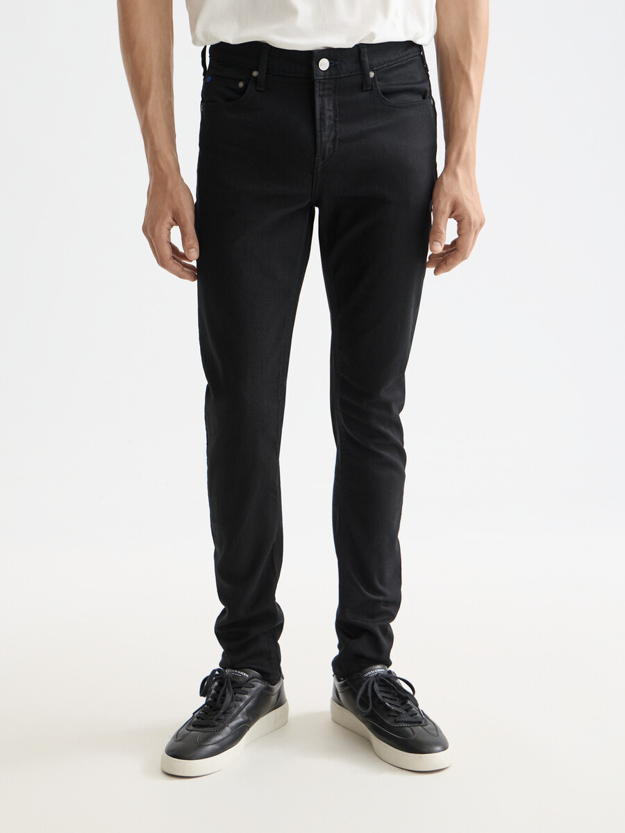 essentials — skim skinny jeans stay black