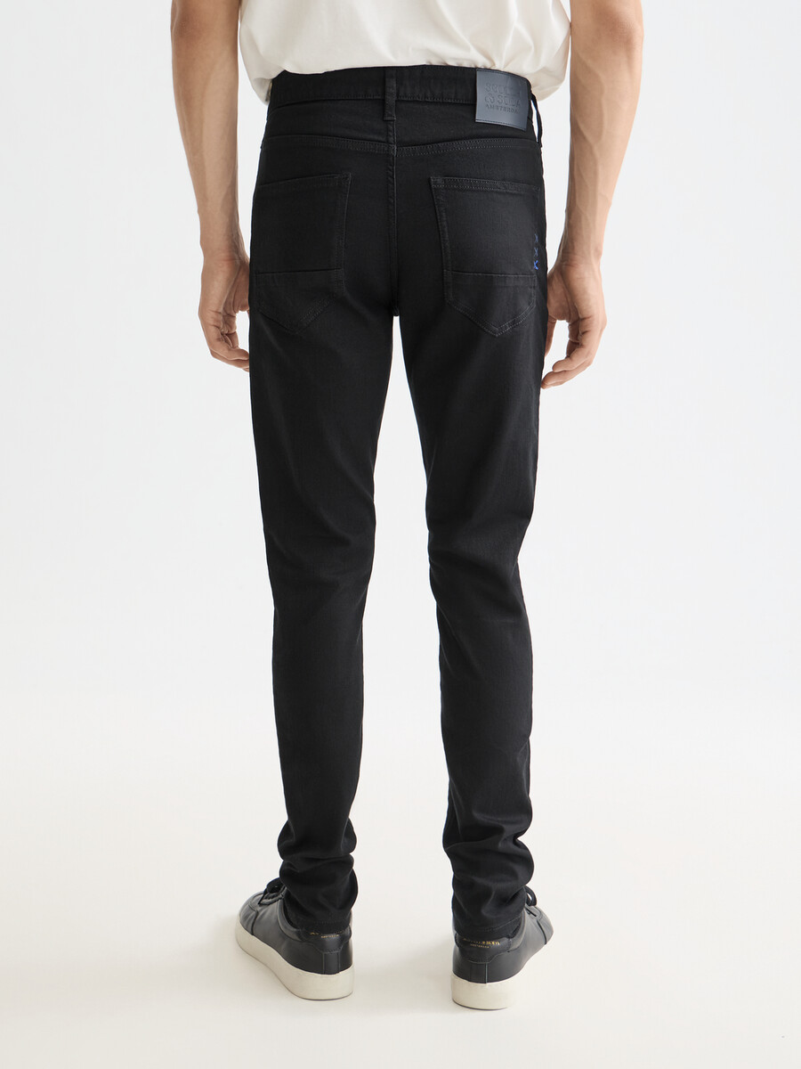 essentials — skim skinny jeans stay black