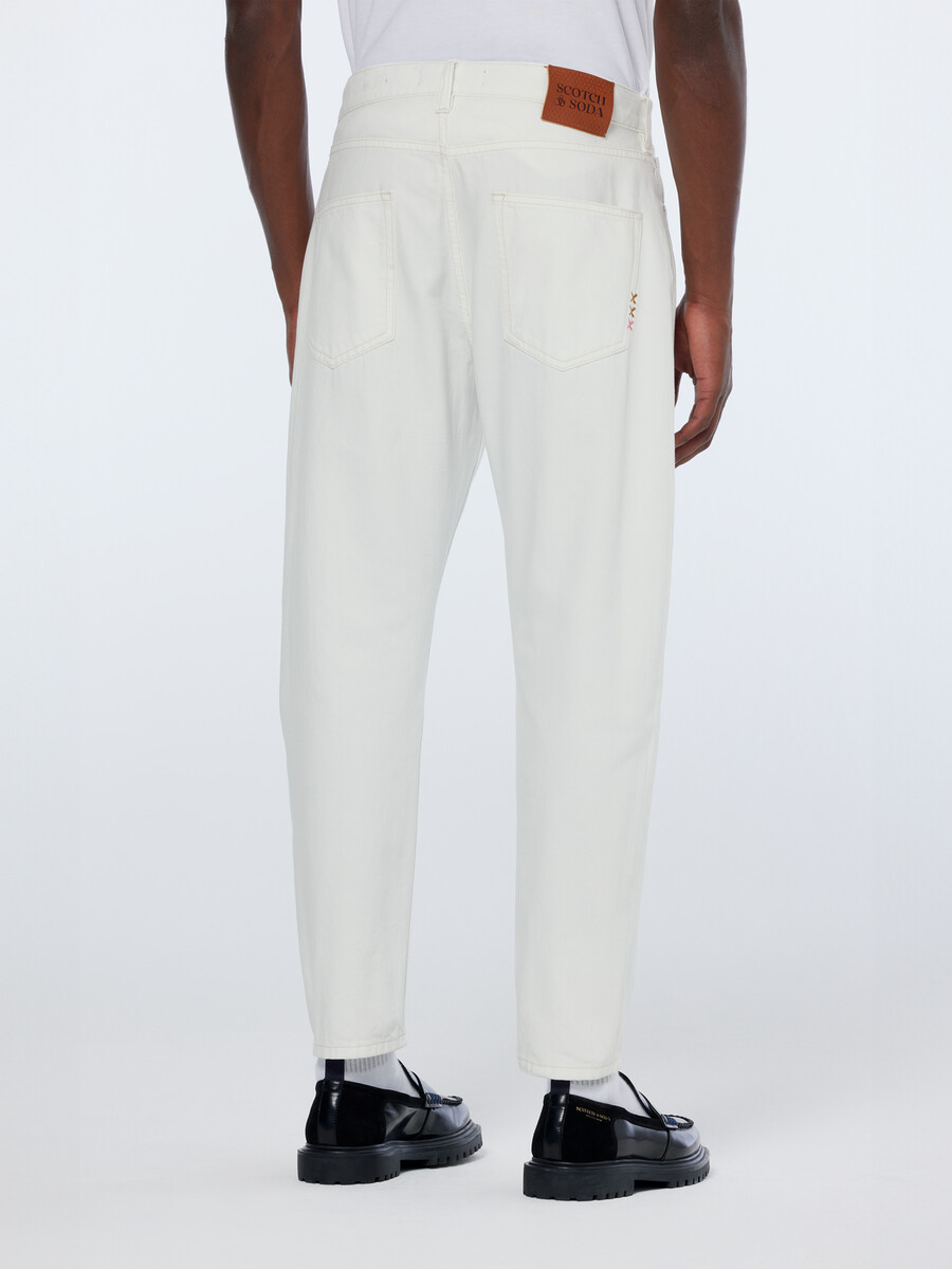 dean loose taper jeans tennis white