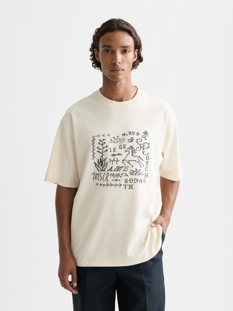 locker geschnittenes t-shirt mit kreuzstich-frontmotiv